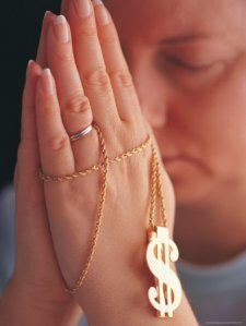 542421-fbwoman-praying-with-money-rosary-posters-6679048