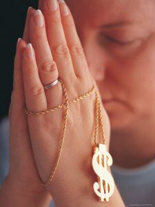 542421-fbwoman-praying-with-money-rosary-posters-1094537