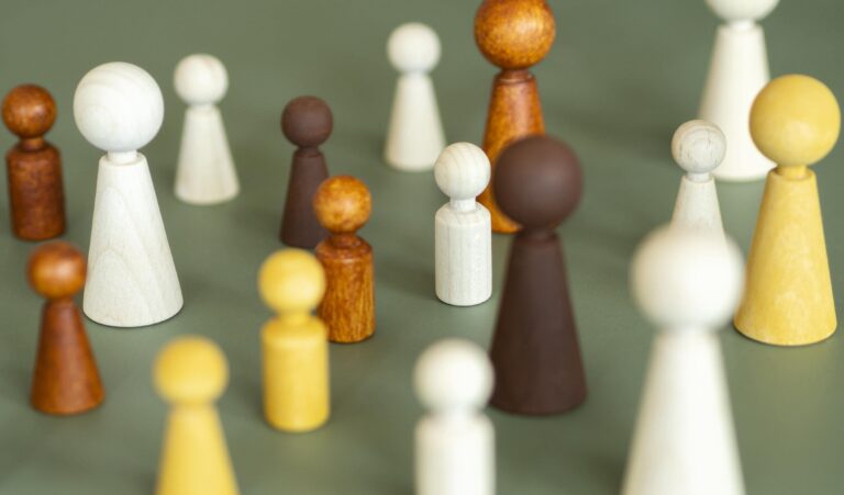 high-angle-chess-wooden-pieces-min
